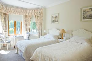 Postel nebo postele na pokoji v ubytování Cahergal Farmhouse B&B
