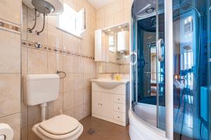Kúpeľňa v ubytovaní S1 - studio just 50m from the beach with sea view