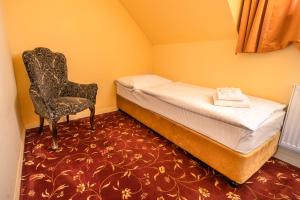 En eller flere senger på et rom på Spa Hotel Vita