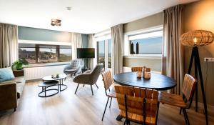Χώρος καθιστικού στο Lido Zeezicht appartementen