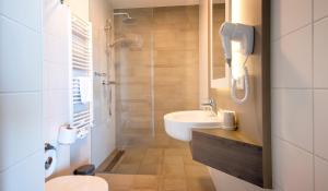 Ένα μπάνιο στο Lido Zeezicht appartementen +21 φωτογραφίες