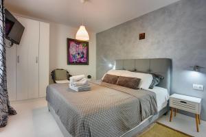 Łóżko lub łóżka w pokoju w obiekcie Holiday Home Zoya