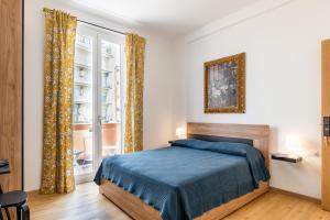 Krevet ili kreveti u jedinici u okviru objekta Catania Central Guest House - Rooms with Balcony
