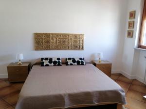 A bed or beds in a room at Daniel's House Gravina