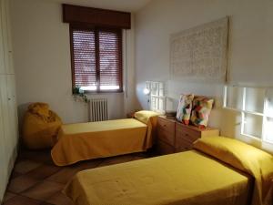 A bed or beds in a room at Daniel's House Gravina