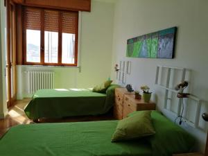 A bed or beds in a room at Daniel's House Gravina