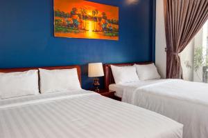 Letto o letti in una camera di Mad Monkey Hostel Siem Reap
