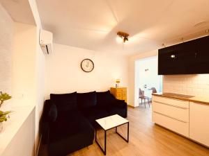 Kuchyňa alebo kuchynka v ubytovaní Apartman Lobel
