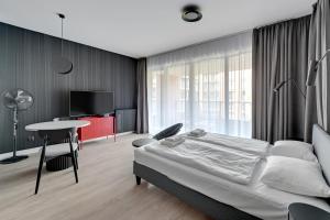Posteľ alebo postele v izbe v ubytovaní Gdańsk Comfort Apartaments Łąkowa