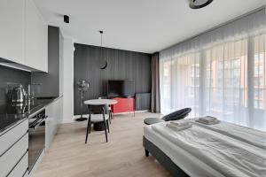 Posteľ alebo postele v izbe v ubytovaní Gdańsk Comfort Apartaments Łąkowa