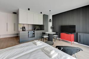 Kuchyňa alebo kuchynka v ubytovaní Gdańsk Comfort Apartaments Łąkowa