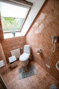 Koupelna v ubytování City Center Kaķis B&B