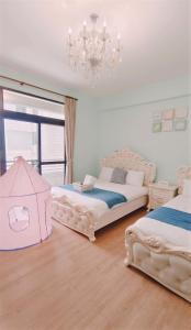 Postel nebo postele na pokoji v ubytování Princess Chloe B&B