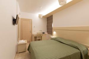 Postel nebo postele na pokoji v ubytování Hotel San Francisco