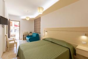 Postel nebo postele na pokoji v ubytování Hotel San Francisco