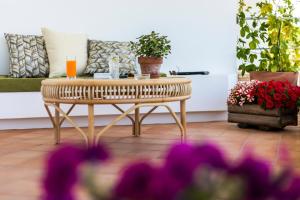 Posezení v ubytování HibiscusUno Tropea Residence