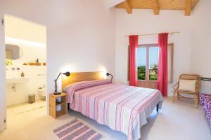 Postel nebo postele na pokoji v ubytování HibiscusUno Tropea Residence
