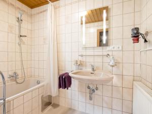 Łazienka w obiekcie Apartment Kraxner