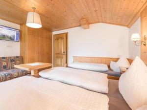 Łóżko lub łóżka w pokoju w obiekcie Apartment Kraxner