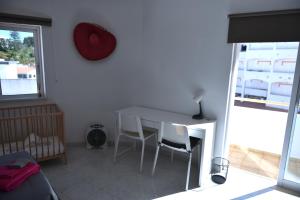 Ein Sitzbereich in der Unterkunft Casa Franki - Stylish and large beach apartment in Algarve