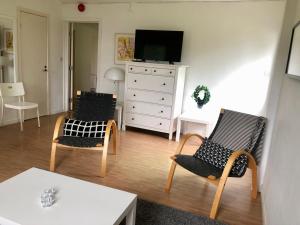 Posedenie v ubytovaní Lägenhet i Hällestrand Semesterby, Laxen