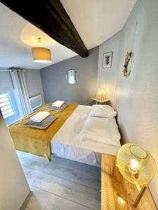 Posteľ alebo postele v izbe v ubytovaní Le VictorH, Clim, Cosy, Hyper-centre