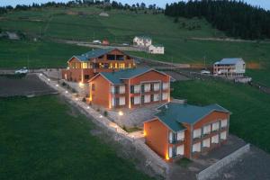 an aerial view of a house on a hill at seyir yeri otel cafe&restorant in Trabzon