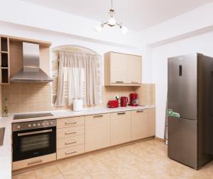 A kitchen or kitchenette at Halkidio House