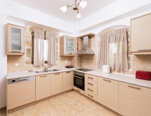 A kitchen or kitchenette at Halkidio House
