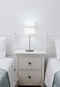 A bed or beds in a room at Halkidio House