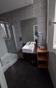 Koupelna v ubytování Hotel Kanaï
