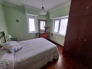 Posteľ alebo postele v izbe v ubytovaní Casa céntrica. A Coruña a 200m de la playa Riazor