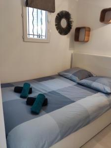 Säng eller sängar i ett rum på Horizon d'Azur
