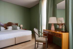 Postel nebo postele na pokoji v ubytování Perugia Park Hotel