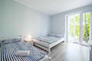 Postel nebo postele na pokoji v ubytování Bedroom - Pokoje
