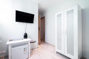 TV a/nebo společenská místnost v ubytování Bedroom - Pokoje