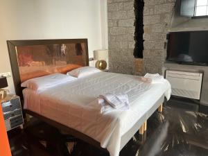 Säng eller sängar i ett rum på Loft romantico con veranda