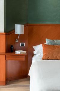 Postel nebo postele na pokoji v ubytování Perugia Park Hotel