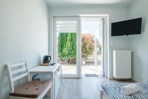 TV a/nebo společenská místnost v ubytování Bedroom - Pokoje