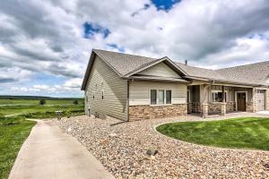 a house with a gravel driveway in front of it at Luxe Spearfish Hideaway Golf, Hike, Explore! in Spearfish