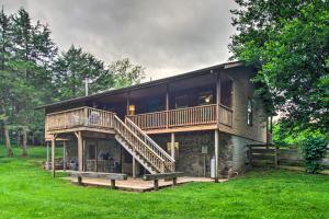 a house with a large deck and a staircase at Pet-Friendly VA Home about 30 Mi to Shenandoah NP in Weyers Cave