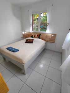 Postel nebo postele na pokoji v ubytování Les Naïades