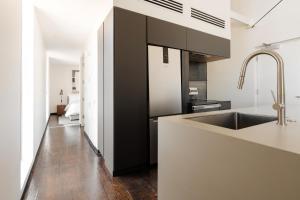 a kitchen with a sink and a counter at Sonder Ida in Phoenix