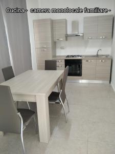 A kitchen or kitchenette at B&B Da Luca