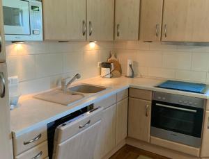 A kitchen or kitchenette at Haus Gorch Fock