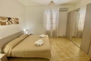 Posteľ alebo postele v izbe v ubytovaní Casa vacanza vista mare
