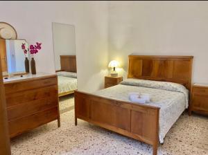 Posteľ alebo postele v izbe v ubytovaní Casa vacanza vista mare