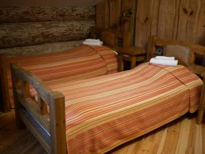 Rúm í herbergi á Greete Motel