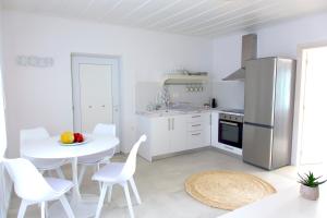 A kitchen or kitchenette at Evgenia Seafront House
