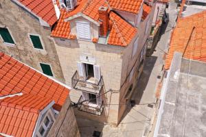 an overhead view of a city with orange roofs at Old town Makarska apartments - central square in Makarska